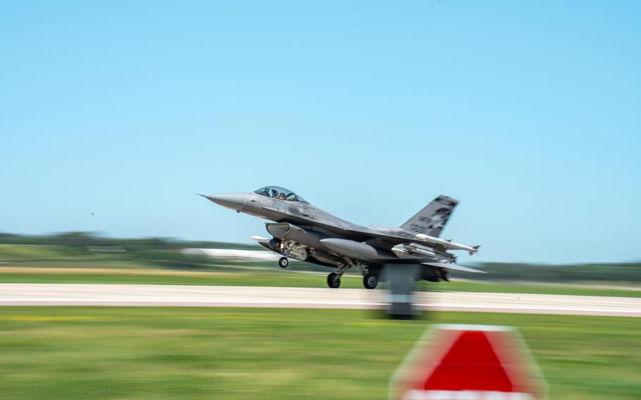 A plane landing on the runway.