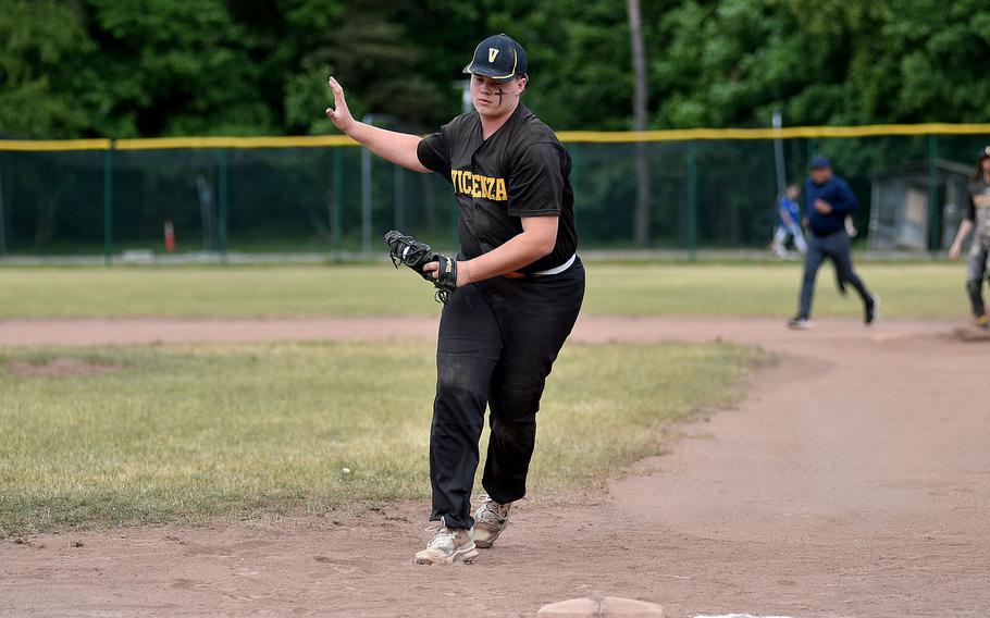 Vicenza first baseman Zach Alderson waives off help covering bag after fielding a ground ball during the Division II/III final against Naples at the 2025 DODEA European baseball championships on May 23, 2025, at Southside Fitness Center on Ramstein Air Base, Germany.