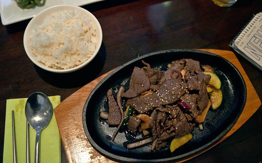 The bulgogi served at Restaurant Gautor Korea in Mainz, Germany, consists of marinated steak, zucchini, mushrooms and red onions served with rice. The entree includes a choice of soup and also three sides.