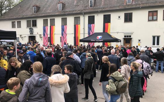 A large crowd of German residents checks out the action at a community festival hosted by U.S. Army Garrison Stuttgart on May 1, 2023. The event was aimed at renewing neighborhood ties that have grown more distant in recent decades due to security actions that followed the 9/11 terror attacks.