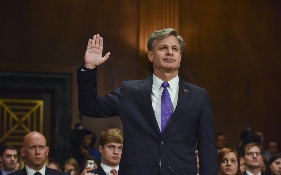 Christopher Wray is sworn in for a confirmation hearing before the Senate Judiciary Committee on his nomination to become FBI director on July 12, 2017. 