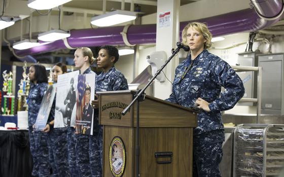 Capt. Amy Bauernschmidt speaks at a Women's History Month function aboard the USS Abraham Lincoln in 2017, when she was the aircraft carrier's executive officer. She later became the ship's commanding officer and this month was nominated for elevation to the rank of one-star admiral.