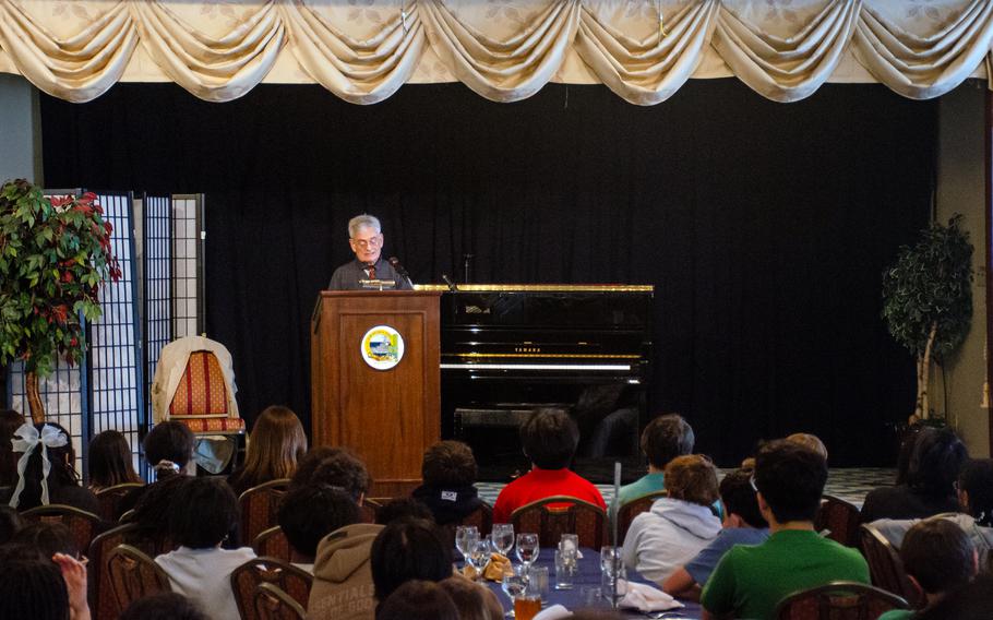 Holocaust survivor Janos Cegledy tells his story to middle-school students in the Officers' Club at Yokosuka Naval Base, Japan, May 10, 2024.