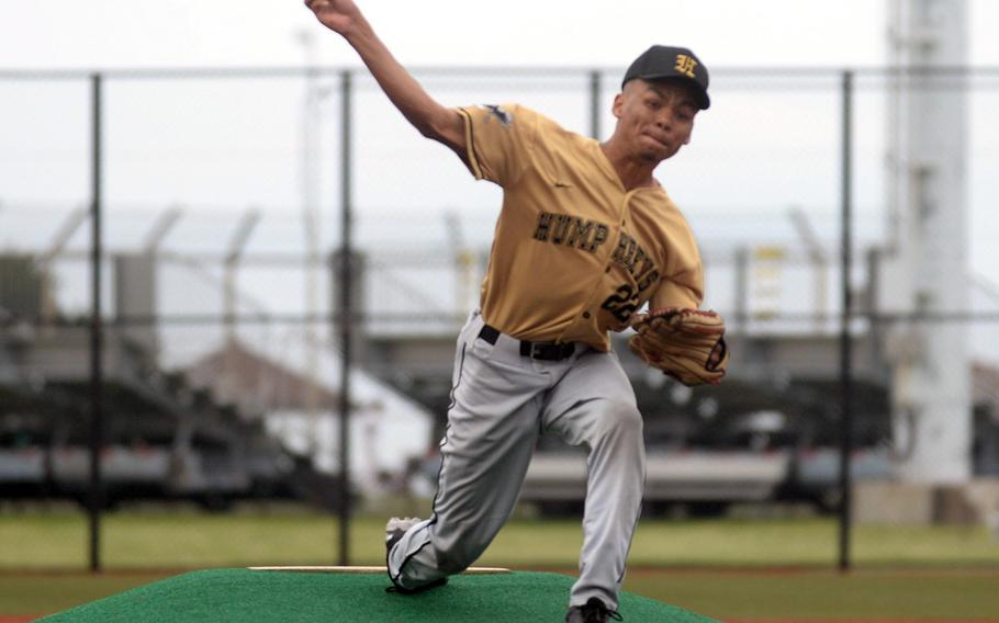 Humphreys’ Donovan Brown delivers against American School In Japan during Monday’s Division I baseball game. The teams tied 3-3.