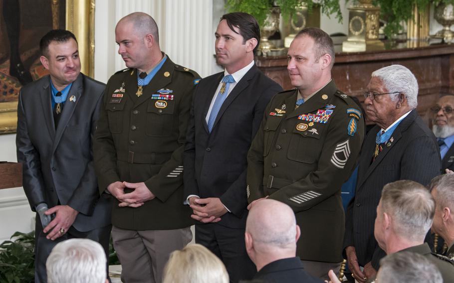 Medal of Honor recipients who attended the White House ceremony on Friday, March 3, 2023, as retired Army Col. Paris Davis received the military’s highest award for his heroic combat actions in Vietnam in 1965 are, from left: former Army Master Sgt. Leroy Petry; Army Sgt. Maj. Matthew O. Williams; former Army Capt. William D. Swenson; Army Master Sgt. Earl D. Plumlee; and former Army Sgt. 1st Class Melvin Morris.