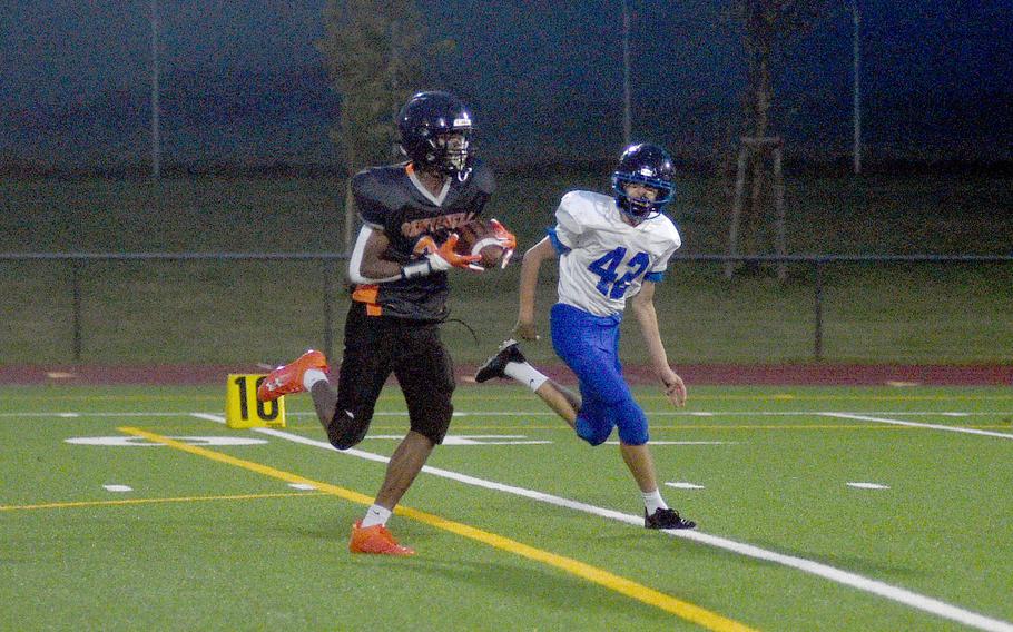 Sentinel receiver Robert Leggett runs after the catch en route to a 29-yard touchdown during the first quarter of a Sept. 29, 2023, game at Spangdahlem High School in Spangdahlem, Germany.