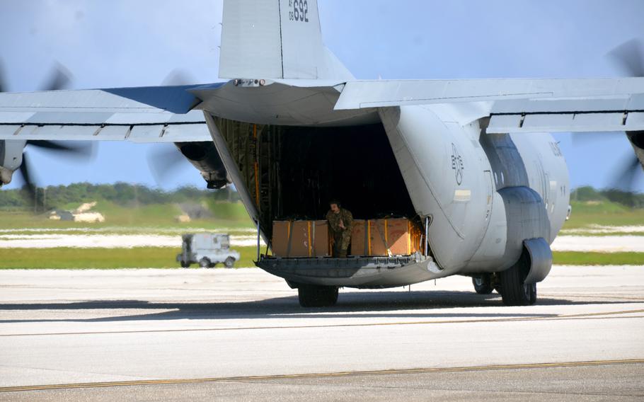 A C-130J Super Hercules from the 374th Airlift Wing at Yokota Air Base in Tokyo takes part in the annual "push off" ceremony for Operation Christmas Drop at Andersen Air Force Base, Guam, Monday, Dec. 5, 2022.