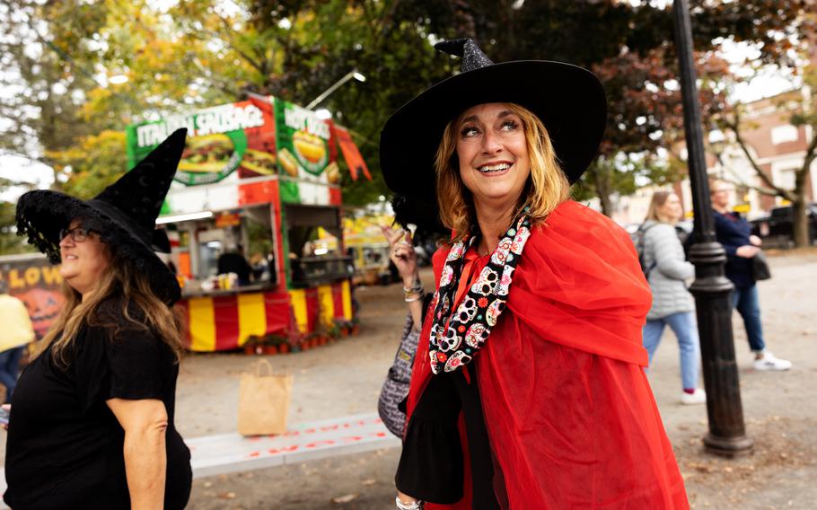 Witch enthusiasts Mellissa Campo, left, and Tammie Cash visit Salem, Mass., from Rhode Island. Last October, Salem welcomed more than 900,000 tourists — about 20 times the city’s population, according to a U.S. Census estimate. 