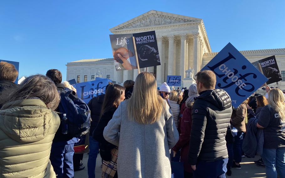 Protesters gather in D.C. as the Supreme Court hears oral arguments in Dobbs v. Jackson Women’s Health Organization on Wednesday, Dec. 1, 2021.
