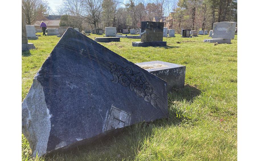 A driver crashed off Bridge Road into St. Mary Cemetery in Northampton before dawn on Saturday, April 8, damaging nearly 20 gravestones. (Will Katcher/MassLive).