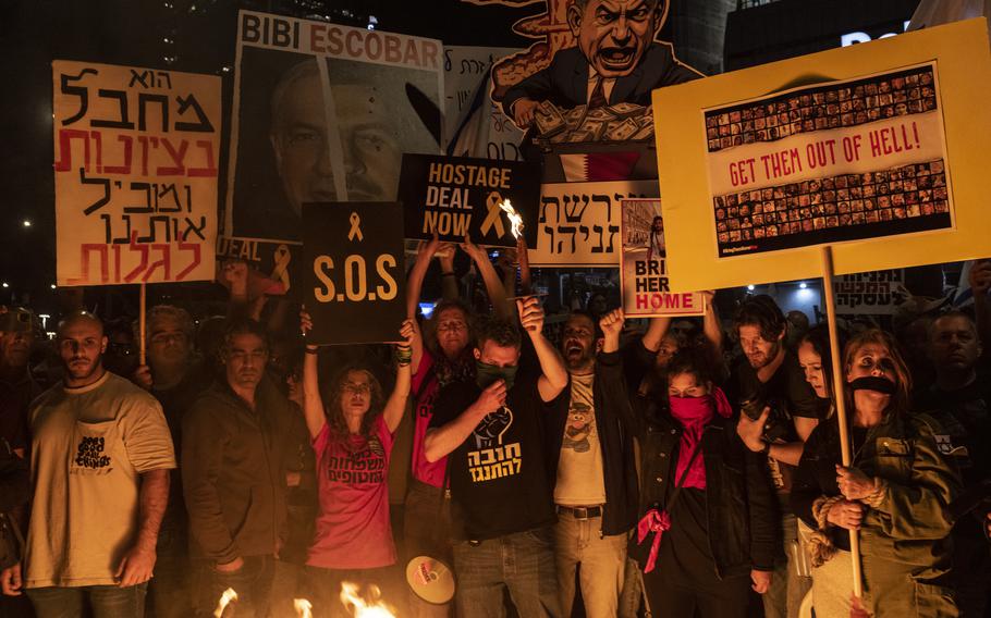 Protesters call for the release of hostages held in the Gaza Strip and rally against Israeli Prime Minister Benjamin Netanyahu and his government Saturday in Tel Aviv. 