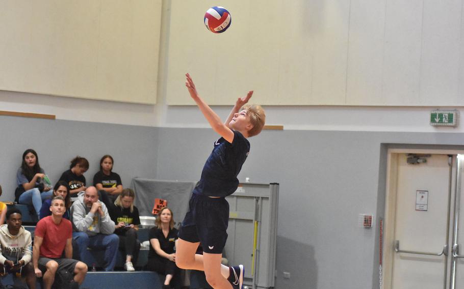 Black Forest Academy sophomore Timothy Sivonen launches a jump serve Saturday, Oct. 29, 2022, during the Falcons’ victory in the championship game of the DODEA-Europe boys volleyball tournament.