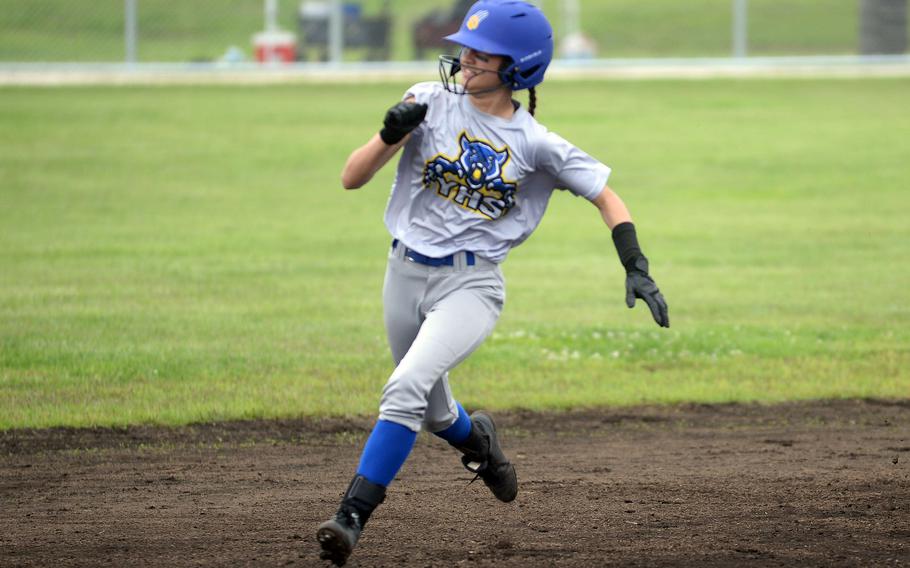 Erica Haas sprints around the bases.