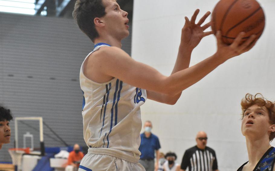 Hohenfels' Nolan McCollum scores during the Tigers' game against Brussels on Thursday, Feb. 24, 2022, at the DODEA-Europe Division III basketball championships.