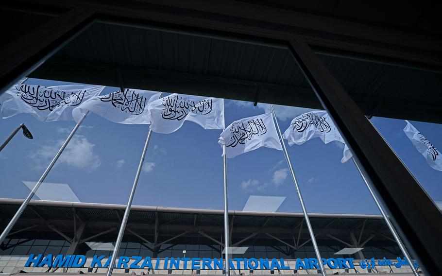 The Taliban flags installed at the Hamid Karzai International Airport are pictured in Kabul on Sept. 11, 2021. 
