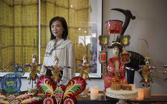 Erin Phuong Steinhauer, co-founder of the Vietnam Society, is surrounded by handmade goods Sept. 26, 2023, in Falls Church, Va., that will be part of Vietnam Week, a celebration of Vietnamese food, film, art and literature.