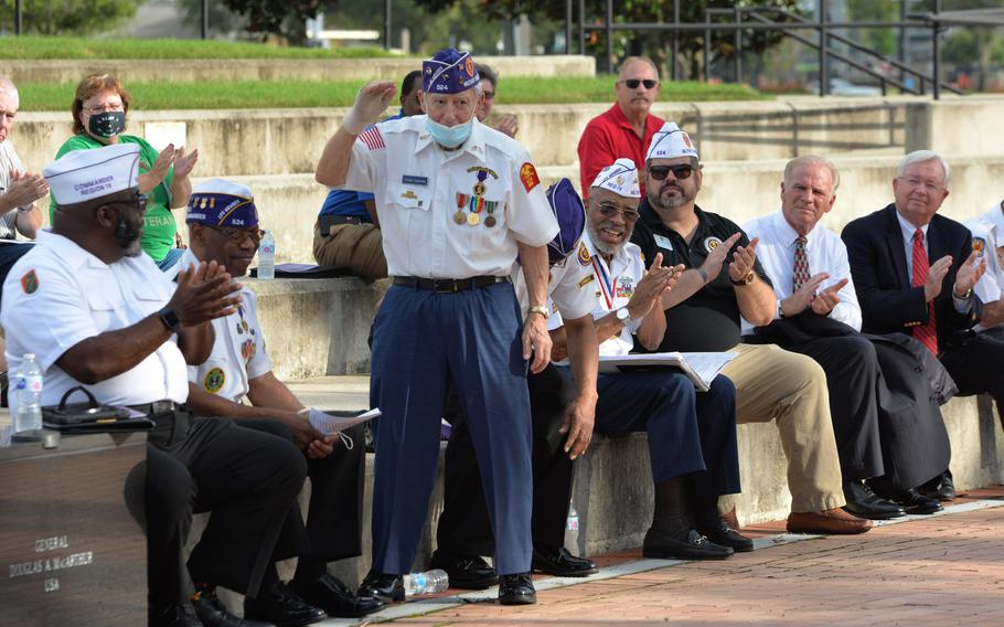 U.S. Navy and D-Day veteran Frank Purpura, 95, stands to be honored on Friday, Aug. 6, 2021, during a tribute to Purple Heart recipients. 