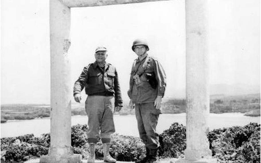 Maj. Gen. Roy S. Geiger, left, and Lt. Gen. Buckner at the Tori Gate at the Shinto Shrine on Okinawa.