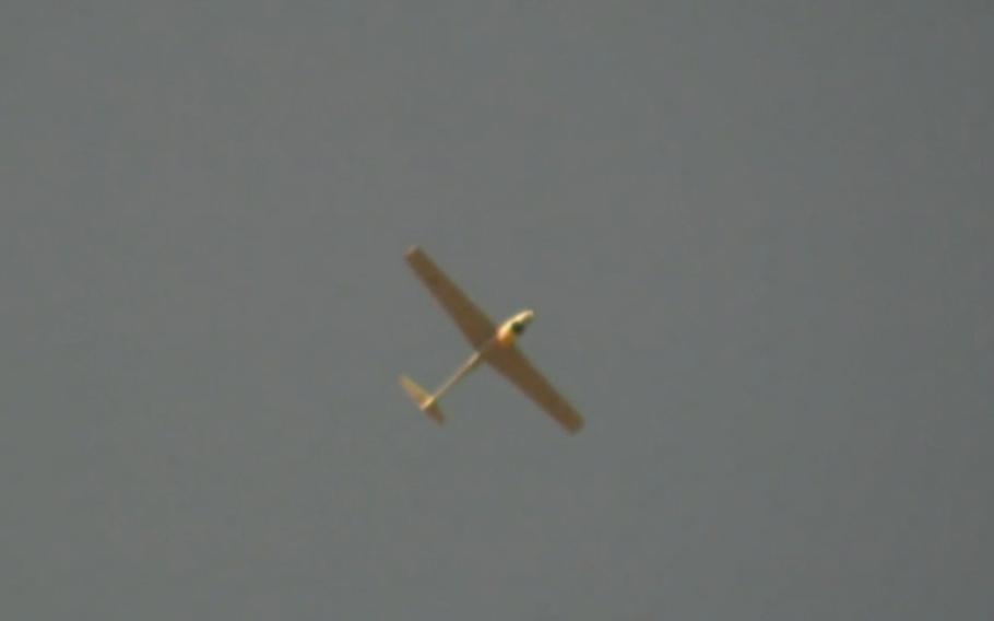 A drone that U.S. Central Command says was Iranian-made flies over a U.S. base in northeastern Syria on Feb. 14. 2023. U.S. forces shot down the drone, CENTCOM said.
