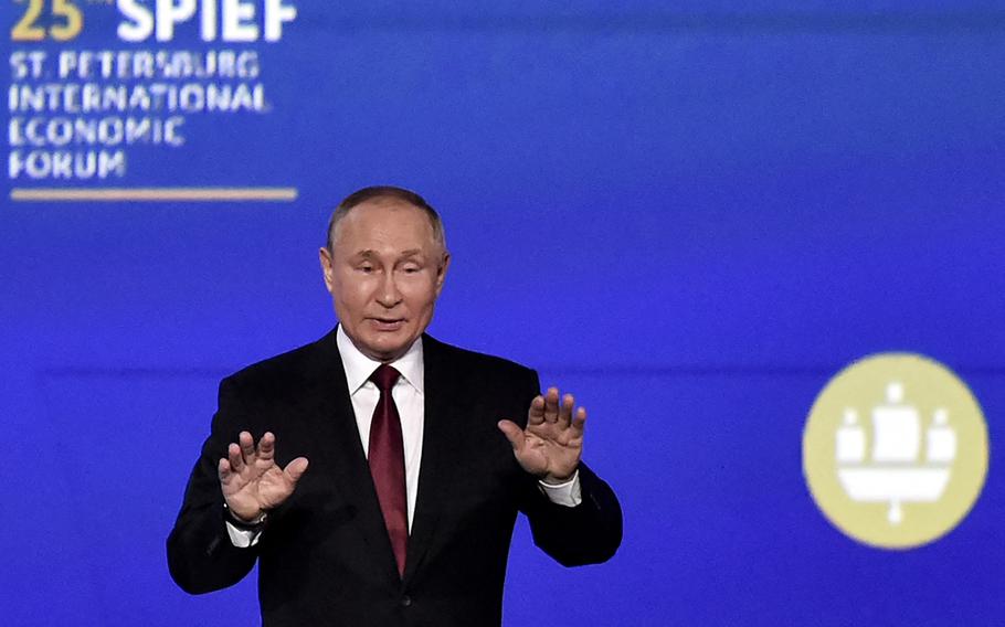 Russian President Vladimir Putin attends a plenary session of the Saint Petersburg International Economic Forum (SPIEF) in Saint Petersburg on June 17, 2022.