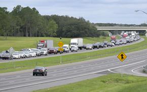 Eastbound traffic crowds Interstate 4 as people evacuate in preparation for Hurricane Ian approaches the western side of the state, Tuesday, Sept. 27, 2022, in Lake Alfred, Fla. 