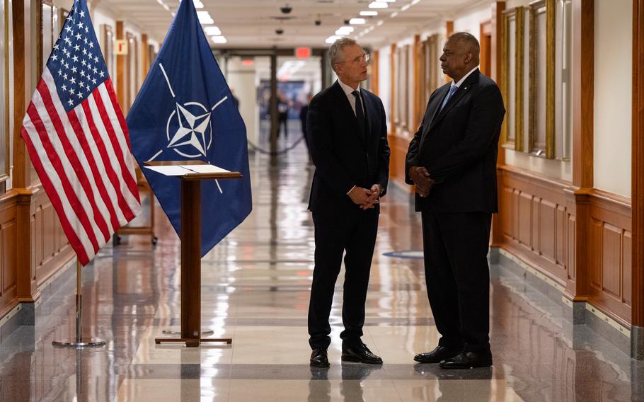 Secretary of Defense Lloyd J. Austin III speaks with NATO Secretary General Jens Stoltenberg during a bilateral exchange at the Pentagon in Arlington, Va., Wednesday, Feb. 8, 2023. 