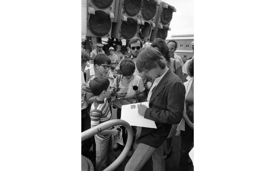 Mark Hamill  signs autographs aboard the U.S. Navy destroyer Hammond, docked at Yokosuka Naval Base.