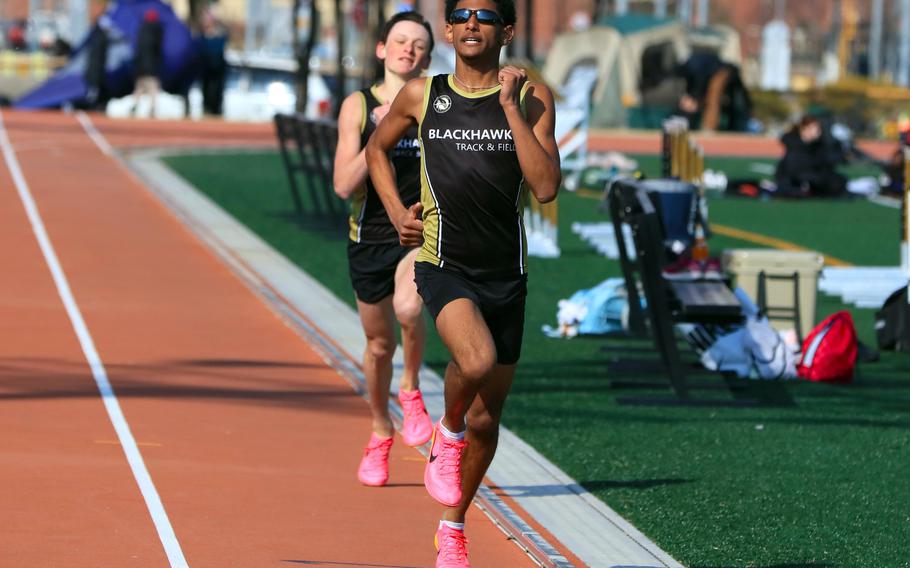 Humphreys' Terrence Burnell and Joey Brown head down the home stretch toward a 1-2 finish in the 1,600 during Wednesday's Korea track and field meet.