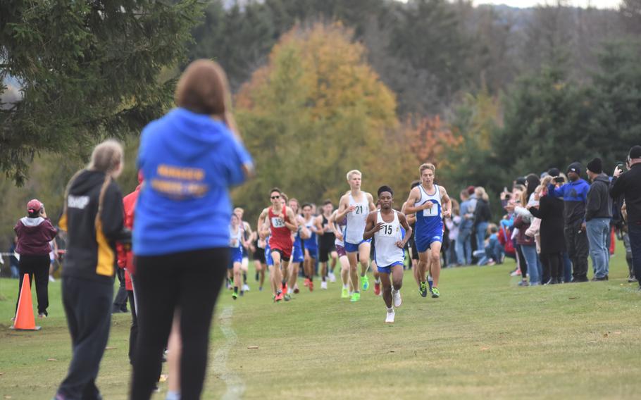 Wiebaden’s Elijah Smith leads a pack of runners at the DODEA-Europe cross country championships on Saturday, Oct. 23, 2021, in Baumholder, Germany.