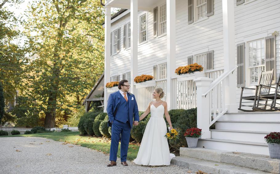 This photo shows Shelley Kapitulik-Jaye and her husband, Stephen Jaye, on Oct. 20, 2021, in Norwalk, Conn.. The two wed on a Wednesday, tapping into a trend of couples choosing weekdays for their weddings, either by choice or necessity.