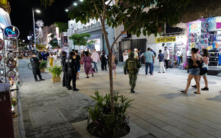 Security forces patrol a main tourist artery in Playa del Carmen. 