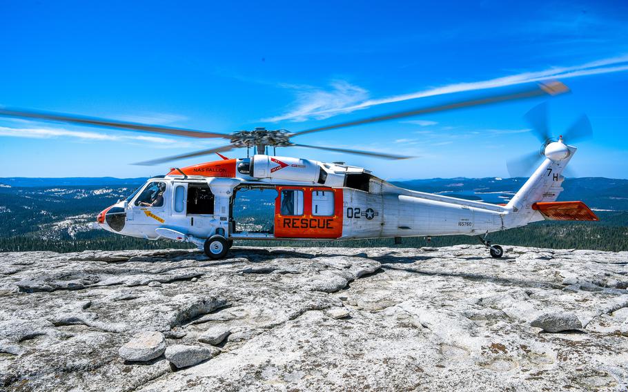 An MH-60S Knighthawk helicopter assigned to the “Longhorns” of Helicopter Search and Rescue Squadron lands during a Last Final Flight on April 9, 2021.