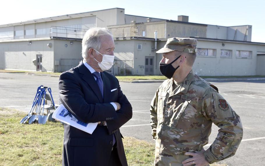 Congressman Richard Neal (L) talks with Colonel Joseph Janik, commander of the 439th Airlift Wing, Westover Air Reserve Base, before a groundbreaking ceremony for a new Regional ISO Maintenance Hangar on the base.   