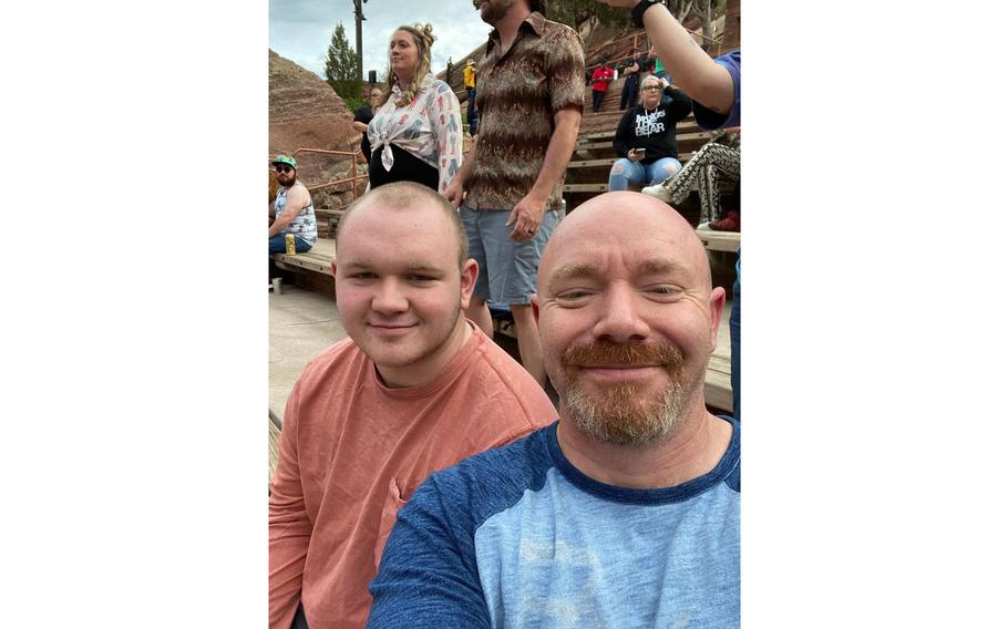 Brian Orr and his son, Gage Orr, are shown at an outdoor event in summer 2023 at Red Rocks Amphitheatre in Colorado.