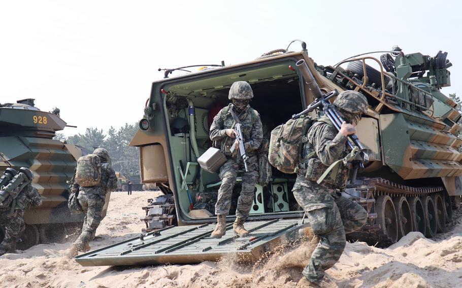 South Korean marines disembark from their amphibious assault vehicle  during the Ssangyong Exercise in Pohang, South Korea, March 29, 2023.  