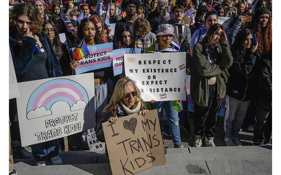 Demonstrators protest on March 29, 2023, at the Kentucky State Capitol in Frankfort, Ky. 