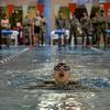 An airman surfaces to catch his breath during the clothed lap swim portion of the German Armed Forces Badge for Military Proficiency at Ramstein Air Base, Germany, April 22, 2024.