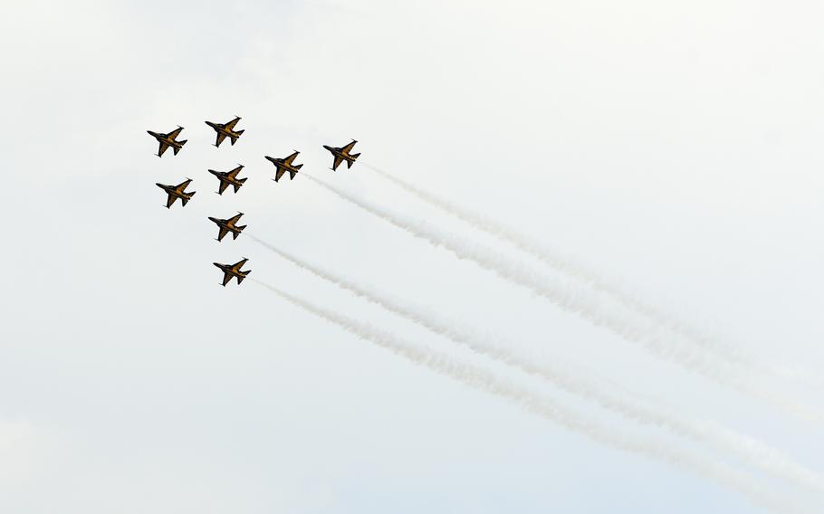 Black Eagles soar in formation during an airpower festival at Osan Air Base.