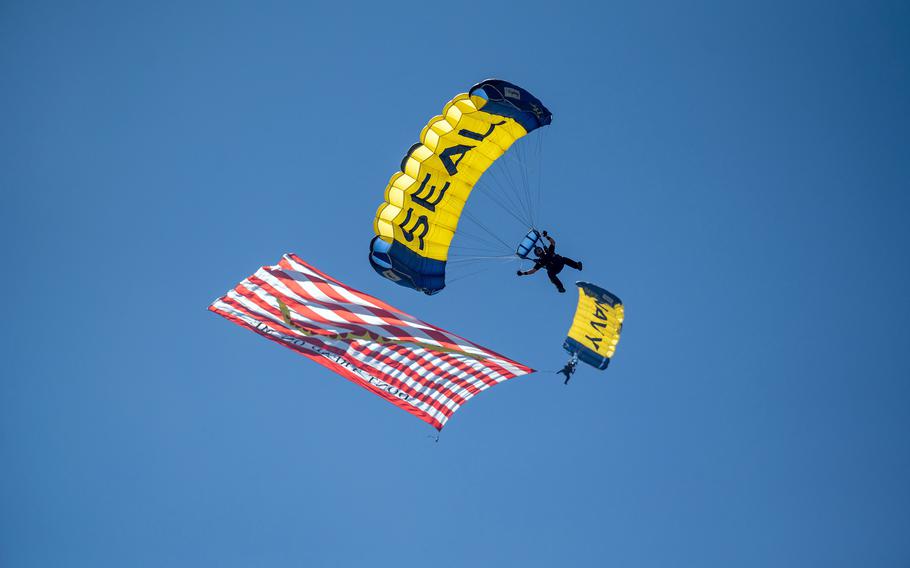 Members of the U.S. Navy Parachute Team, also known as the Leap Frogs, jump over Coronado, Calif., July 4, 2023.