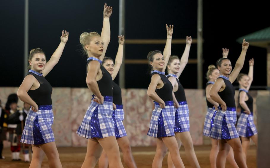 Dancers perform a synchronized routine.