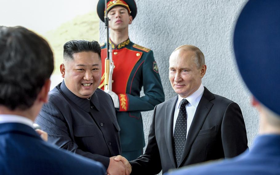 Russian President Vladimir Putin, center right, and North Korea’s leader Kim Jong Un shake hands during their meeting in Vladivostok, Russia, Thursday, April 25, 2019. U.S. officials expect Kim to visit Russia in the coming days to seal a possible deal on munitions as Moscow seeks to replenish its military machine by tapping Pyongyang’s huge arsenal.