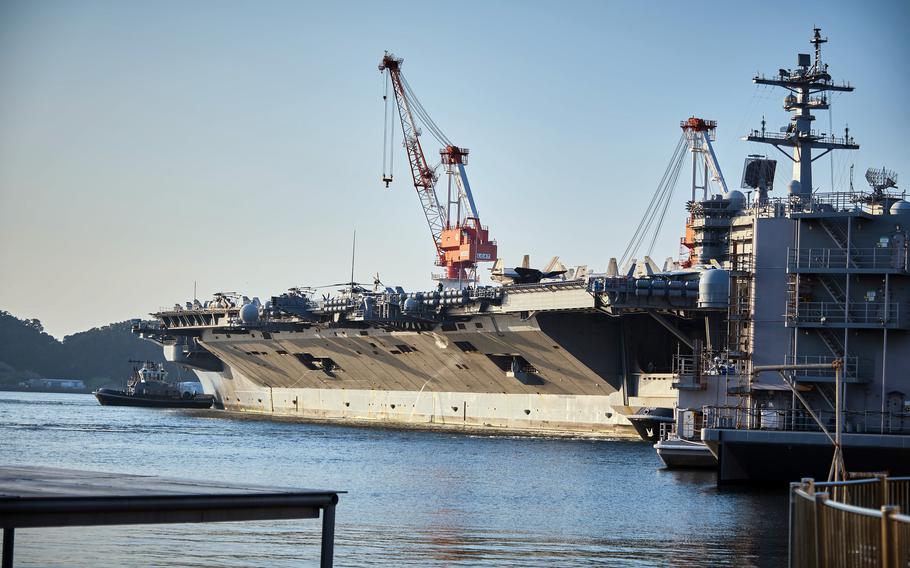 The USS Carl Vinson aircraft carrier arrives for a port call at Yokosuka Naval Base, Japan, Saturday, Aug. 28, 2021.