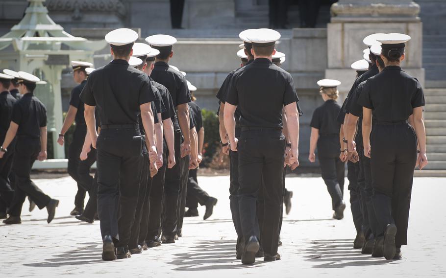 Midshipmen participate in noon meal formation in 2019 at the U.S. Naval Academy, Annapolis, Md. 