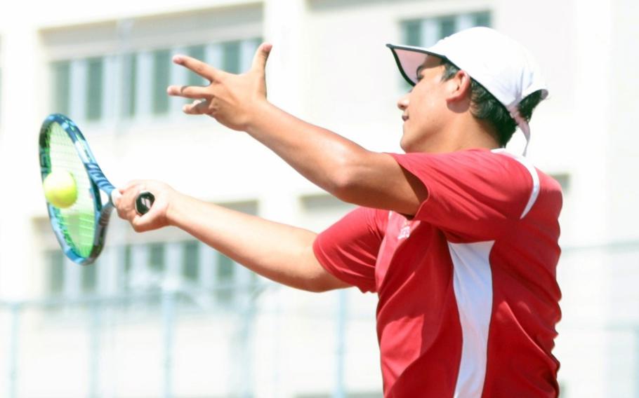 Tavi Shah hits the ball.