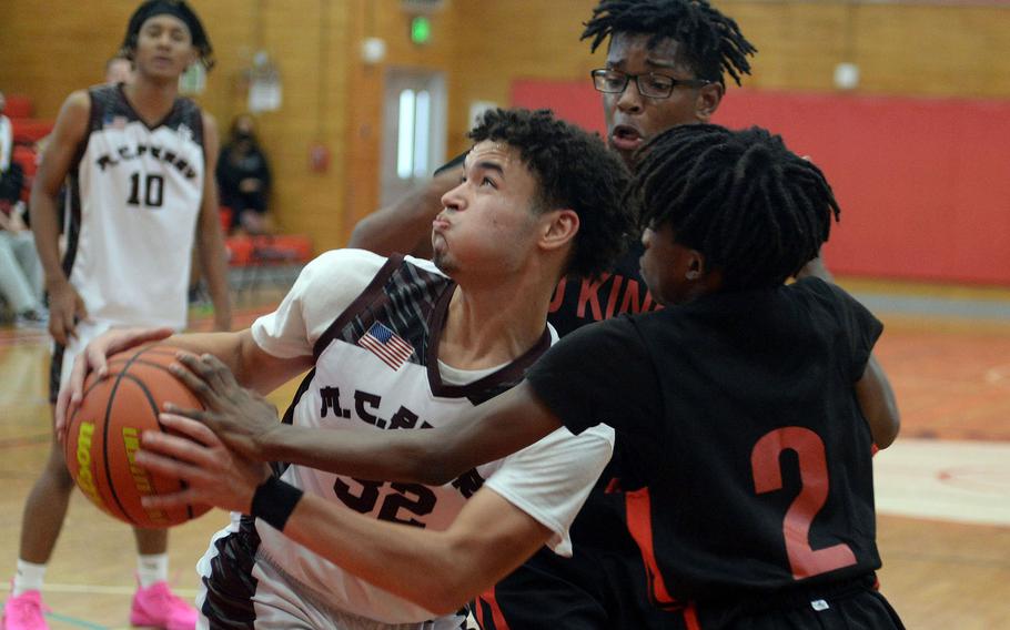 Roy Clayton III, left, and Matthew C. Perry square off with Keith Lombard, Jeremy Phillips and E.J. King this weekend in the first action for both teams since December.