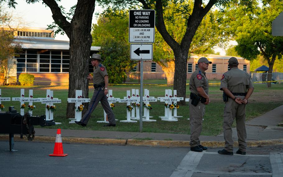 White crosses honor the victims of the deadly shooting at Robb Elementary School in Uvalde, Texas.