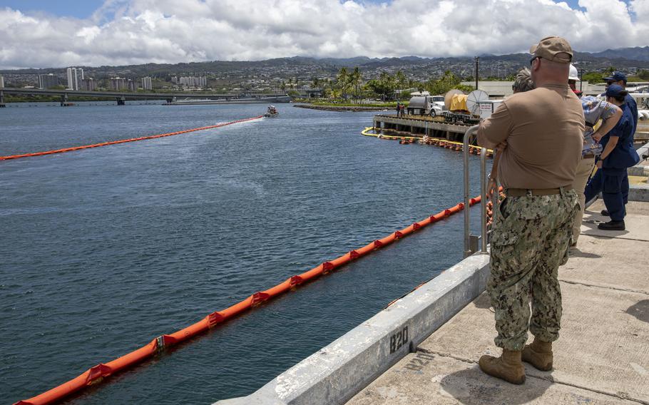 Joint Task Force-Red Hill (JTF-RH) and spill response personnel perform and observe a spill response exercise on Joint Base Pearl Harbor-Hickam, Hawaii, June 8, 2023.