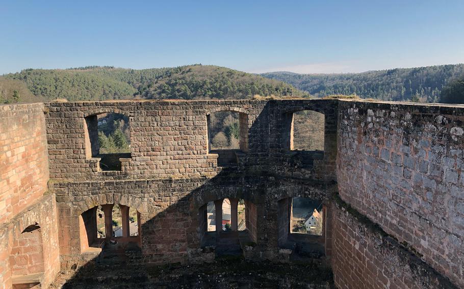 The sun shines on the walls of Frankenstein Castle ruins on a spring day in March 2021.