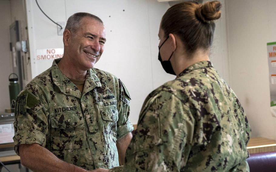 Vice Adm. Roy Kitchener, commander of Naval Surface Force, U.S. Pacific Fleet, speaks with a sailor assigned to the USS Preble on May 20, 2021, while the ship was in San Diego.