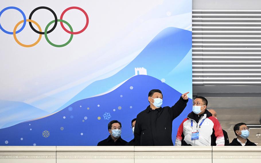 Chinese President Xi Jinping tours the National Speed Skating Oval, a competition venue for the 2022 Winter Olympics, in Beijing, Tuesday, Jan. 4, 2022. Competition for the Winter Olympics is scheduled to begin on Feb. 4.